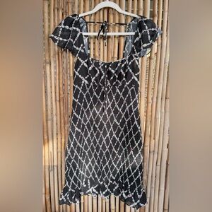 The East Order Romy Mini Dress in Daisy Chains